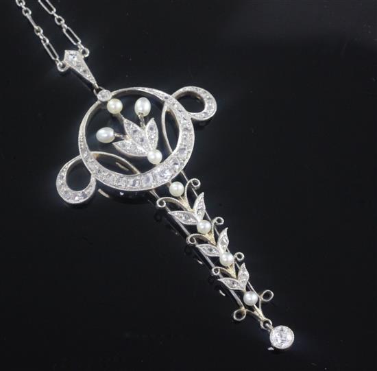 A Belle Epoque gold and platinum, diamond and seed pearl pendant, pendant 2.25in.